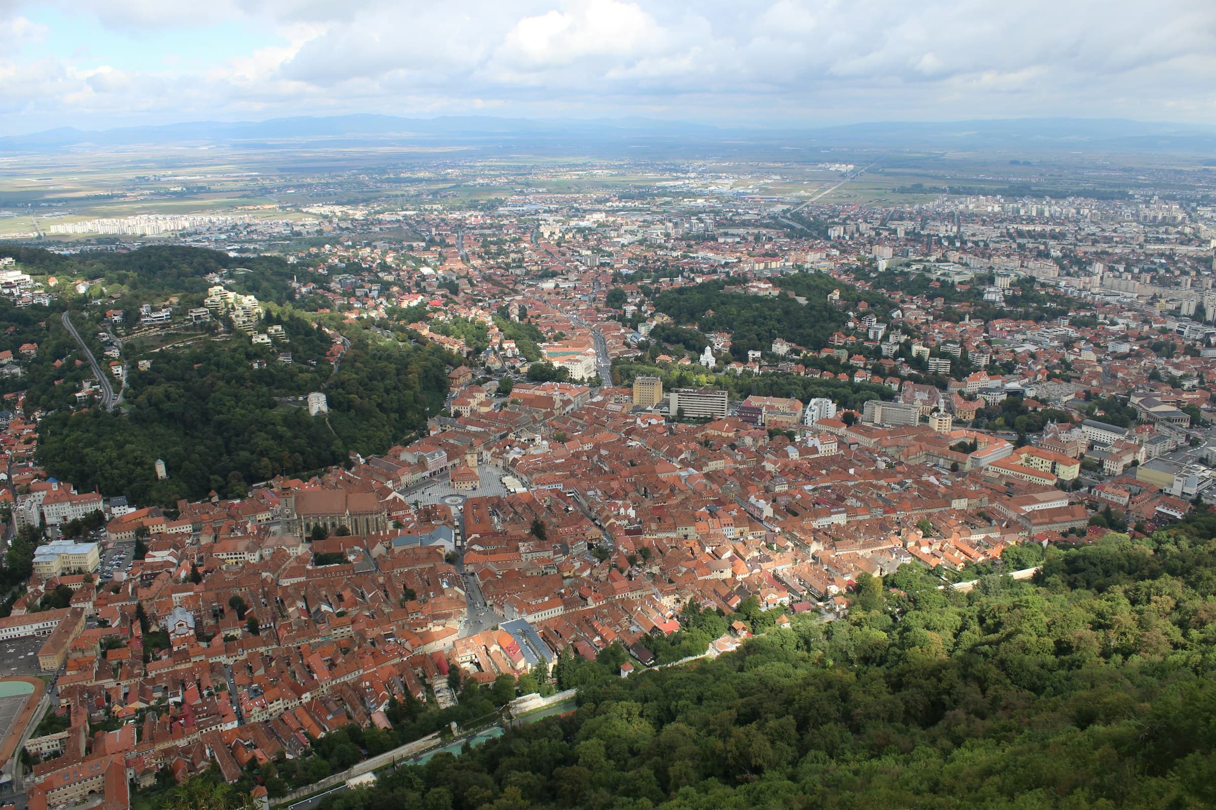 Brașov, Romania, surrounded by forested hills